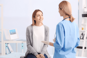 woman and a doctor in a doctors office